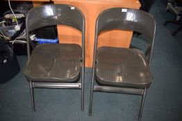 *Pair of folding metal chairs