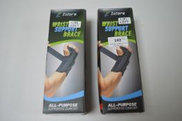 Two Zofore wrist support braces l/XL left