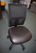*Black mesh backed adjustable swivel office chair