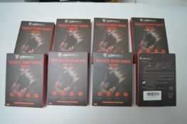 Eight Comforce right hand thumb and wrist braces