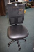 *Black mesh backed adjustable office swivel chair