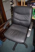 *Black adjustable office swivel chair