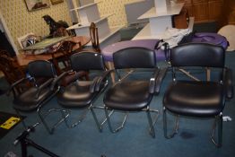 *four chrome leatherette armchairs