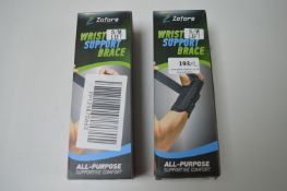 Two Zofore wrist support braces S/M left