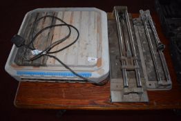 *Electric Tile Cutter, and Two Manual Tile Cutters