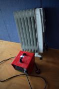 *Electric Fan Heater and an Oil Filled Radiator