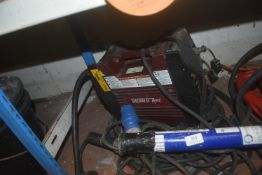 Thermal Arc Welder with Quantity of Welding Rods