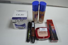 Assorted Makeup and Olay Night Cream
