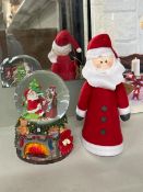 * Snowglobe and felt Santa tree topper