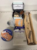 Navigation parallel ruler, pin badges and a selection of blank DVDs and protective casings