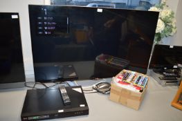 LG 48” 3D TV with 3D Glasses, Blu-ray Discs, and a LG 3D Blu-ray Player