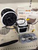 Selection of heating equipment to include a plug in foot warmer and a candle and collapsible bucket