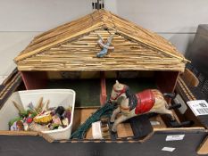 Christmas nativity scene, rocking horse and lights