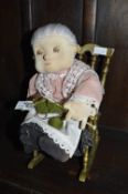 Granny in Brass Rocking Chair