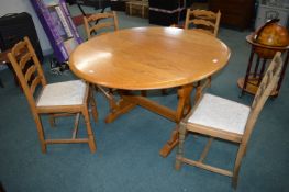 Ercol Drop Leaf Oval Dining Table with Four Leather Backed Chairs
