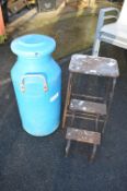 Folding Step Stool and a Blue Plastic Churn