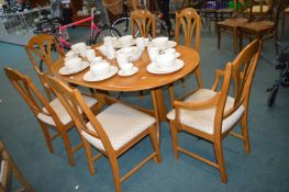 Ercol Oval Extending Dining Table with Matching Chairs