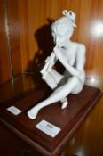 Kaiser Porcelain Figure of a Piper on Wooden Plinth