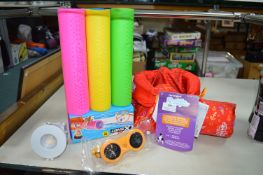 *Puddle Jumper Swimming Aids, Foam Water Blasters, and a Downlight