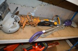 Titan 240v Grass Trimmer, and a Genie Express Steamer