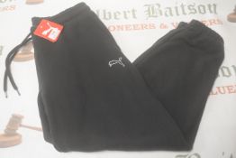 *Puma Black Joggers Size: M