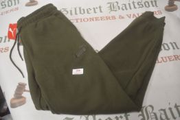*Puma Green Joggers Size: M