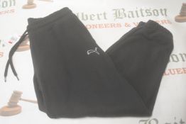 *Puma Black Joggers Size: M