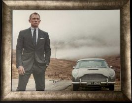 Daniel Craig / James Bond and the Aston Martin DB5 Signed Exhibition Board
