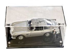 Sean Connery Signed 1:18 Aston Martin DB5 Model and Figurine Presentation