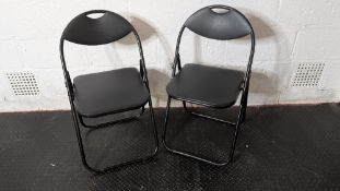 (2) Black padded folding chairs