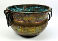 A large 19th century or earlier Eastern copper jardiniere