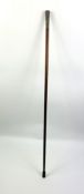 A 19th century rosewood walking cane with a decorative silver handle