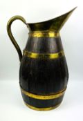 A large 19th century brass bound coopered jug