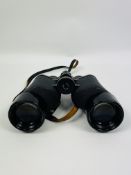 A pair of leather cased Carl Zeiss 10 x 50 binoculars