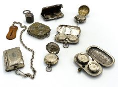 Four silver coin/sovereign holders together with four other coin holders
