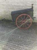 PLUMBER'S HAND CART, a traditional two-wheeled cart featuring a black wooden chest body.