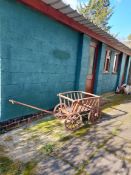 SMALL WOODEN HAND CART, a charming four-wheeled wooden cart with iron-rimmed wheels.
