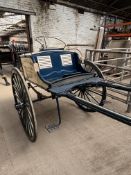 BUTCHER'S CART, a traditional butcher’s cart set on two 16-spoke wheels.