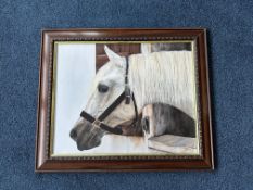 Painting of a grey horse's head over a stable door