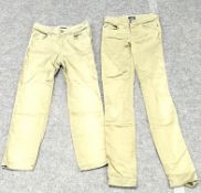 Four pairs of AJ Armani trousers