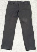 Pair of Gucci black tapered trousers
