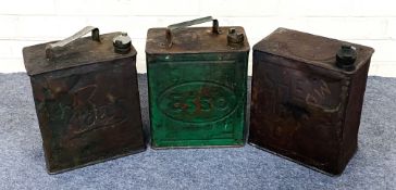 A collection of three early 20th century petrol cans