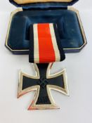 A German pattern Iron Cross 2nd class with ribbon.
