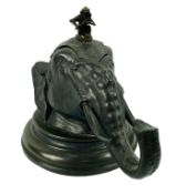 An early 20th century silver plated novelty inkwell in the form of an elephant head