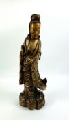 A large early 20th century Chinese carved hardwood figure of Guanyin