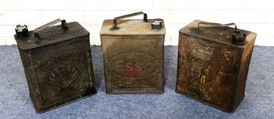 A collection of three early 20th century petrol cans