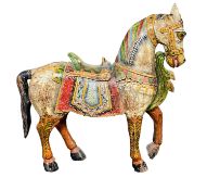 A large polychrome decorated carved Indian horse