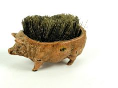 An early 20th century Austrian cold painted bronze pen wipe in the form of a pig
