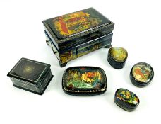 A collection of six various shaped Russian lacquered boxes, mainly depicting fairytale scenes, 19.5c
