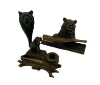 A group of three early 20th century carved Black Forest items to include a carved bear nutcracker